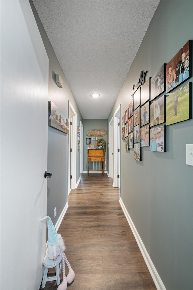 106 Mcfarlin Rd, Murfreesboro, TN 37130 - hallway with a textured ceiling and wood finished floors
