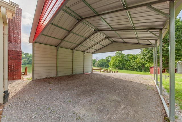 266 Clear Creek Cir, Pulaski, TN 38478 - view of vehicle parking featuring a carport, driveway, and a shed