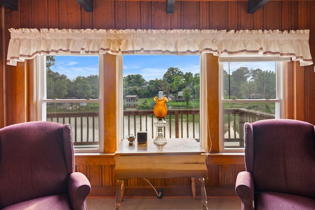 266 Clear Creek Cir, Pulaski, TN 38478 - living area with a water view, wood walls, and view of wooded area