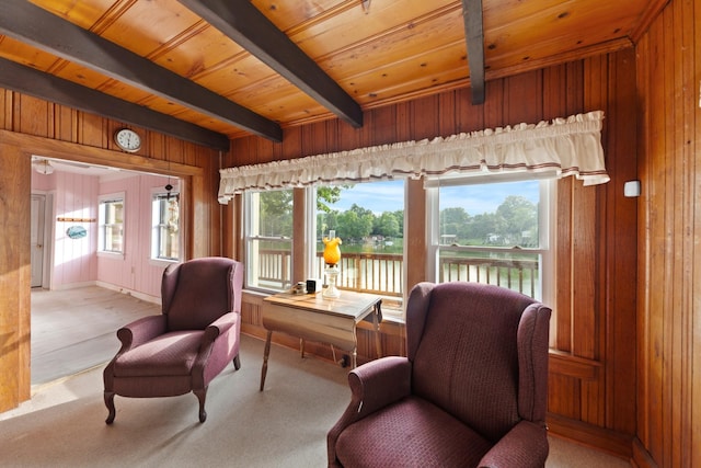 266 Clear Creek Cir, Pulaski, TN 38478 - living area featuring wood walls, a wood ceiling with exposed beams, a water view, and carpet floors