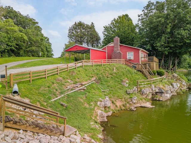 266 Clear Creek Cir, Pulaski, TN 38478 - view of yard featuring a deck, a detached carport, and stairway