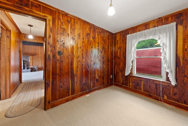 266 Clear Creek Cir, Pulaski, TN 38478 - carpeted spare room with wood walls and a brick fireplace
