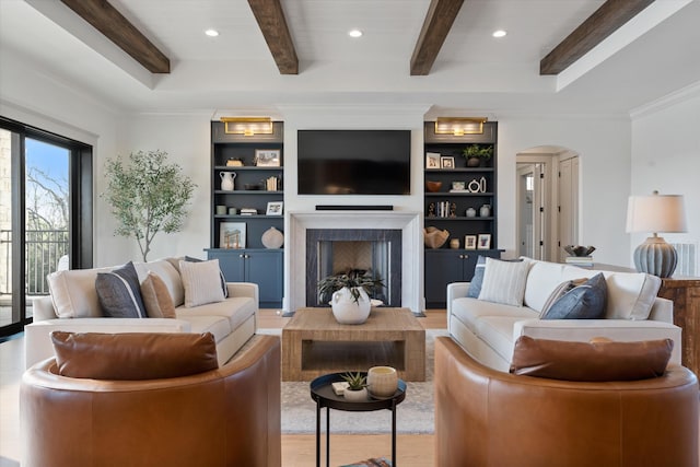 2996 S Rutland Rd, Mount Juliet, TN 37122 - living room with light wood-style flooring, a fireplace, beamed ceiling, arched walkways, and recessed lighting