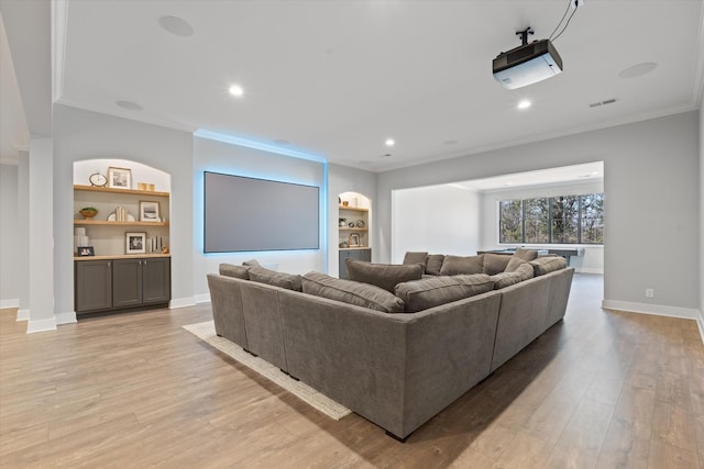 2996 S Rutland Rd, Mount Juliet, TN 37122 - cinema room featuring ornamental molding, built in features, light wood-type flooring, and recessed lighting