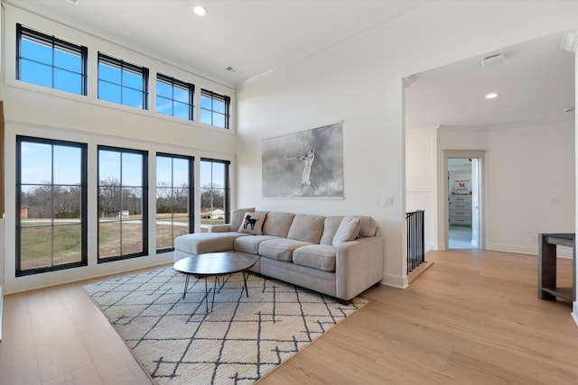 2996 S Rutland Rd, Mount Juliet, TN 37122 - living room with ornamental molding, light wood-style floors, recessed lighting, and a towering ceiling
