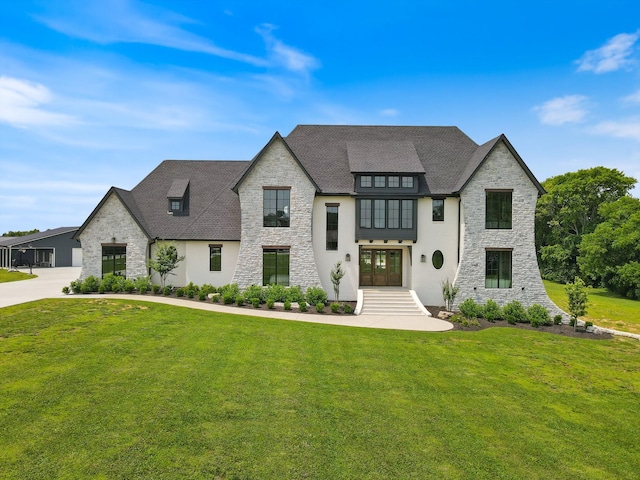 2996 S Rutland Rd, Mount Juliet, TN 37122 - view of front facade featuring stone siding, a front lawn, stucco siding, and french doors