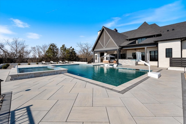 2996 S Rutland Rd, Mount Juliet, TN 37122 - view of pool with a pool with connected hot tub, a patio, and a ceiling fan