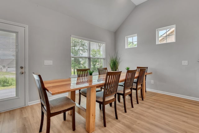 272 Thorpe Dr, Spring Hill, TN 37174 - dining space with light wood-style floors and lofted ceiling