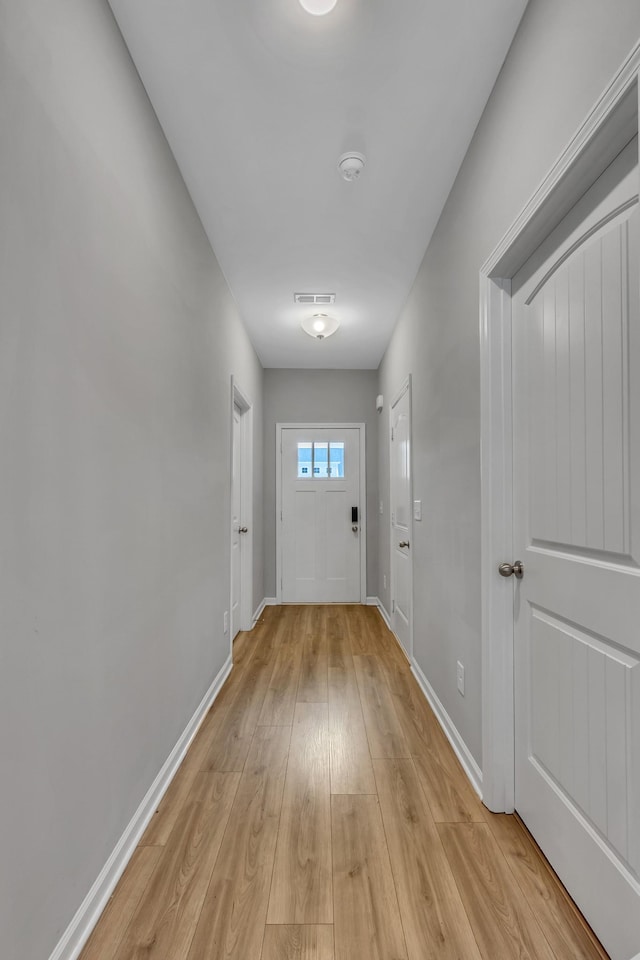 272 Thorpe Dr, Spring Hill, TN 37174 - doorway to outside featuring light wood-style floors and baseboards