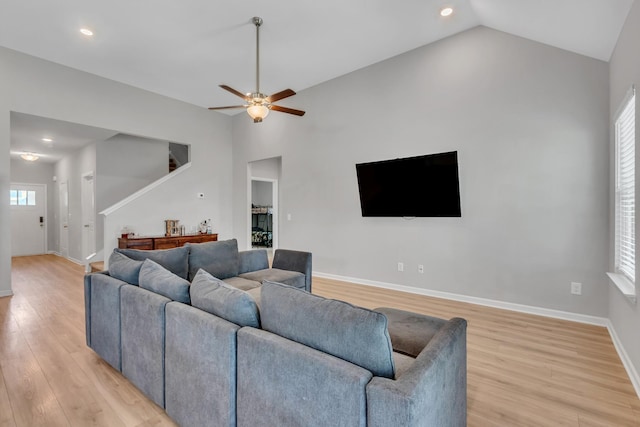 272 Thorpe Dr, Spring Hill, TN 37174 - living area featuring light wood finished floors, ceiling fan, stairway, recessed lighting, and high vaulted ceiling