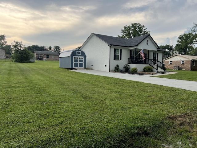 484 Royal Dr, Rock Island, TN 38581 - view of home's exterior with a shed, a lawn, and a porch