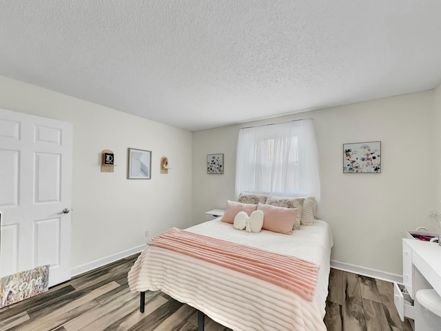 209 River Dr, Mount Juliet, TN 37122 - bedroom with wood finished floors and a textured ceiling