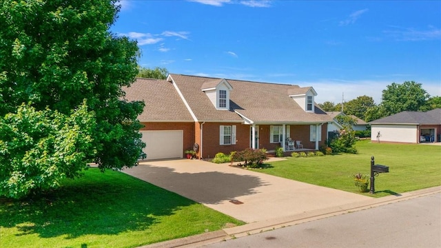 1311 Clifford Dr, Murfreesboro, TN 37129 - cape cod home with covered porch, a garage, concrete driveway, a front yard, and brick siding