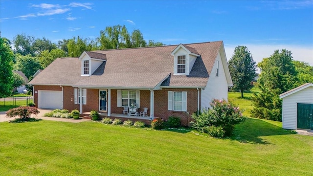 1311 Clifford Dr, Murfreesboro, TN 37129 - cape cod-style house with covered porch, an attached garage, brick siding, a front yard, and driveway