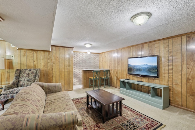 2604 Forest View Dr, Antioch, TN 37013 - carpeted living room with wooden walls and a textured ceiling