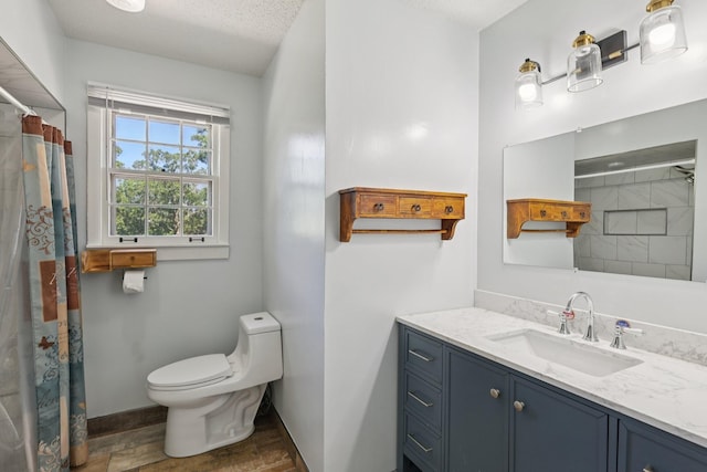 2604 Forest View Dr, Antioch, TN 37013 - bathroom featuring wood finished floors, vanity, and a shower with shower curtain