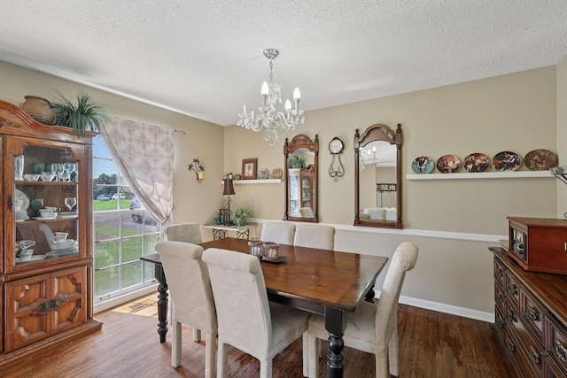 2604 Forest View Dr, Antioch, TN 37013 - dining space with a chandelier, wood finished floors, and a textured ceiling