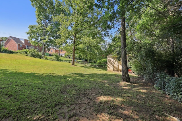 2604 Forest View Dr, Antioch, TN 37013 - view of green lawn featuring a storage shed
