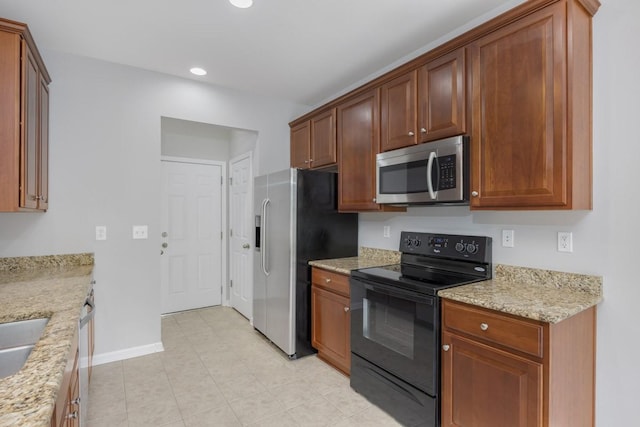 446 Lazy Creek Ln, Nashville, TN 37211 - kitchen featuring stainless steel appliances, recessed lighting, and light stone countertops