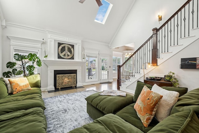 2819 Silver Springs Ct, Murfreesboro, TN 37128 - living area featuring stairs, high vaulted ceiling, wood finished floors, ceiling fan, and ornamental molding