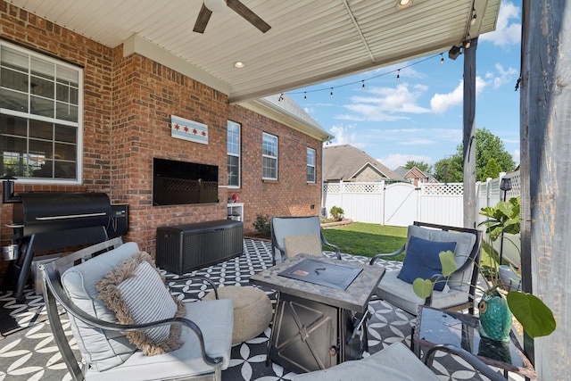 2819 Silver Springs Ct, Murfreesboro, TN 37128 - view of patio featuring a ceiling fan, an outdoor living space with a fire pit, and a gate