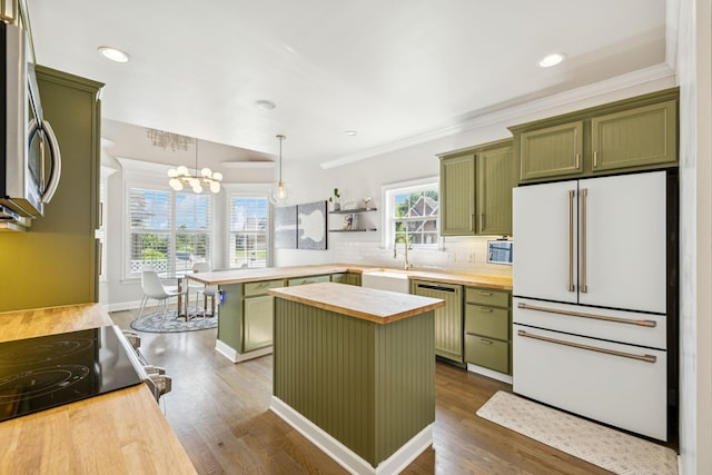 2819 Silver Springs Ct, Murfreesboro, TN 37128 - kitchen featuring green cabinetry, butcher block counters, freestanding refrigerator, dishwashing machine, and ornamental molding