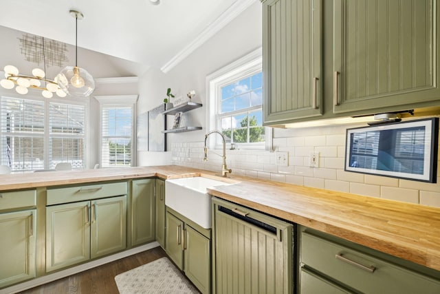 2819 Silver Springs Ct, Murfreesboro, TN 37128 - kitchen featuring wooden counters, green cabinets, lofted ceiling, crown molding, and backsplash
