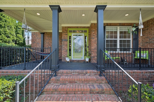 2819 Silver Springs Ct, Murfreesboro, TN 37128 - doorway to property featuring covered porch and brick siding