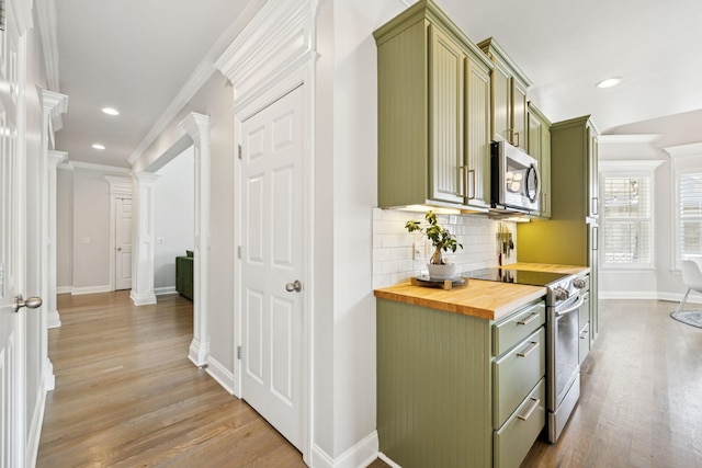 2819 Silver Springs Ct, Murfreesboro, TN 37128 - kitchen featuring green cabinetry, appliances with stainless steel finishes, wooden counters, decorative columns, and light wood-type flooring