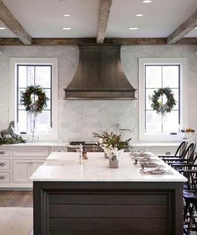 3880 Barfield Crescent Rd, Murfreesboro, TN 37128 - kitchen featuring premium range hood, beamed ceiling, white cabinets, a kitchen island with sink, and wood finished floors