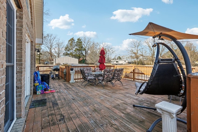 311 Downs Rd, Cumberland City, TN 37050 - deck with outdoor dining area