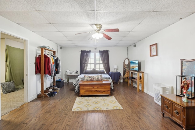 311 Downs Rd, Cumberland City, TN 37050 - bedroom featuring a drop ceiling, wood finished floors, and ceiling fan