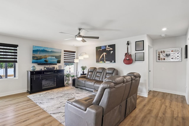 2617 Thornton Grove Blvd, Nashville, TN 37207 - living area with ceiling fan, wood finished floors, healthy amount of natural light, a glass covered fireplace, and recessed lighting