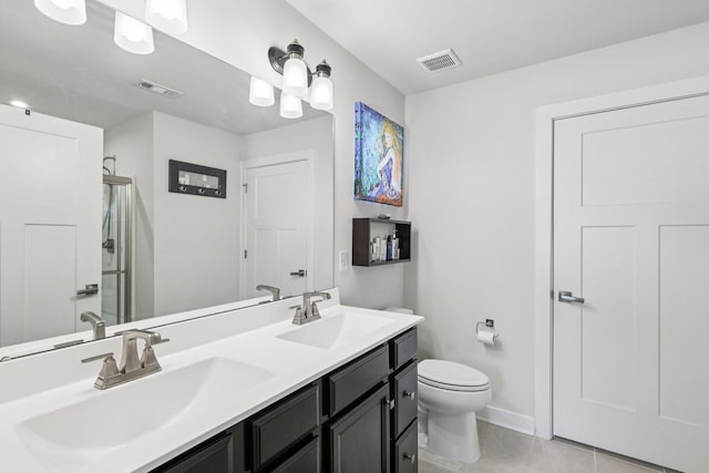 2617 Thornton Grove Blvd, Nashville, TN 37207 - bathroom featuring double vanity, tile patterned floors, and a shower with shower door