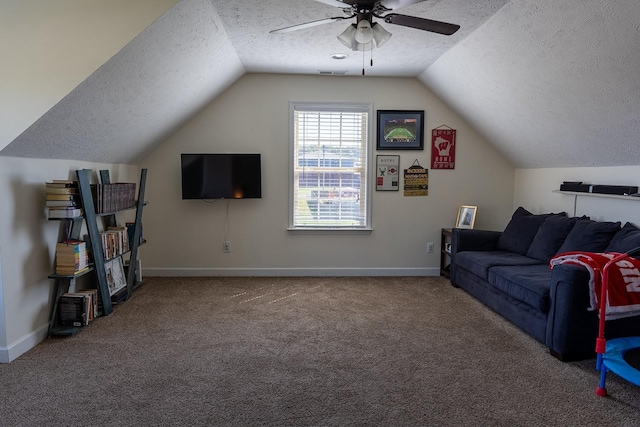1452 Precept Dr, Murfreesboro, TN 37129 - living area featuring a textured ceiling, a ceiling fan, lofted ceiling, and carpet floors