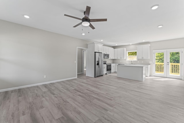 4315 Surji Cir, Centerville, TN 37033 - unfurnished living room with a ceiling fan, light wood-style flooring, and recessed lighting