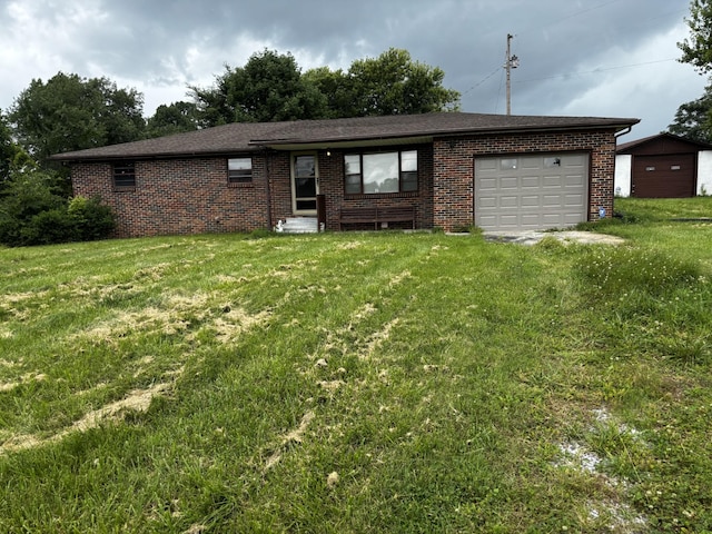 1018 New Hope Rd, Hilham, TN 38568 - view of front of property featuring an attached garage, brick siding, a front lawn, and entry steps