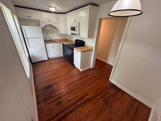 418 W 3rd St, Columbia, TN 38401 - kitchen featuring white appliances, wood counters, white cabinets, and dark wood-style floors