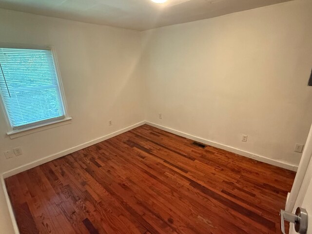 418 W 3rd St, Columbia, TN 38401 - spare room with wood finished floors and baseboards