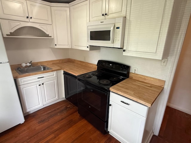 418 W 3rd St, Columbia, TN 38401 - kitchen with white appliances, wood counters, dark wood-style floors, and white cabinetry