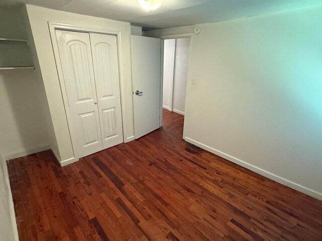 418 W 3rd St, Columbia, TN 38401 - unfurnished bedroom featuring dark wood-type flooring and a closet