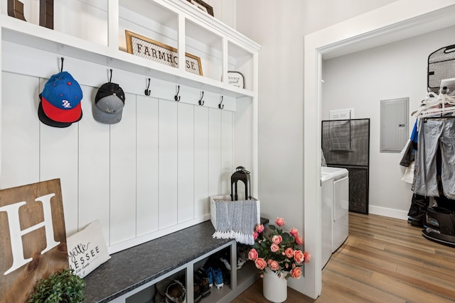 2427 Green Valley Rd, Lafayette, TN 37083 - mudroom with electric panel, independent washer and dryer, and wood finished floors