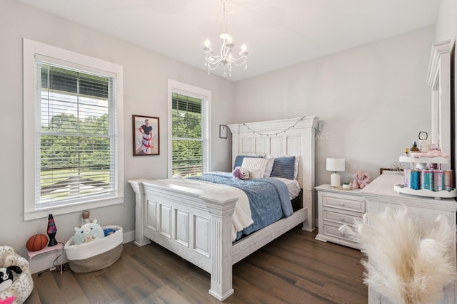 2427 Green Valley Rd, Lafayette, TN 37083 - bedroom with a chandelier and dark wood-type flooring