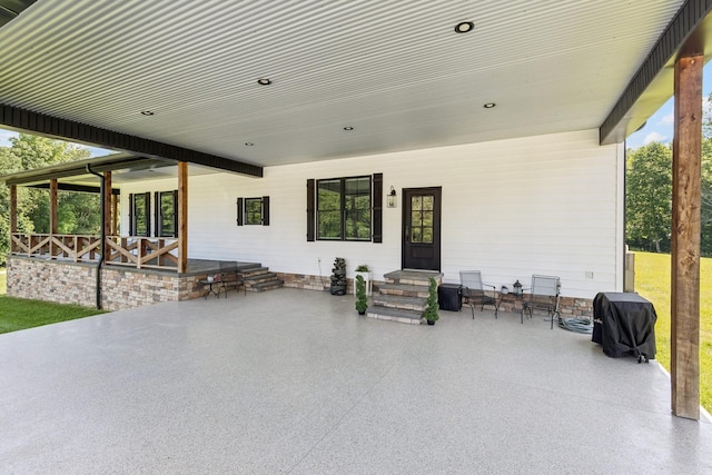 2427 Green Valley Rd, Lafayette, TN 37083 - view of patio featuring a grill and entry steps