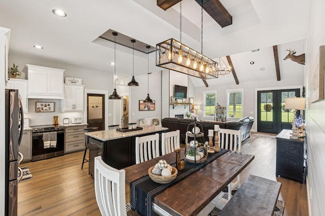 2427 Green Valley Rd, Lafayette, TN 37083 - dining room featuring light wood finished floors, recessed lighting, a chandelier, and french doors
