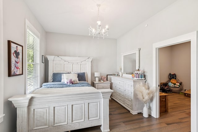2427 Green Valley Rd, Lafayette, TN 37083 - bedroom featuring dark wood finished floors and a chandelier