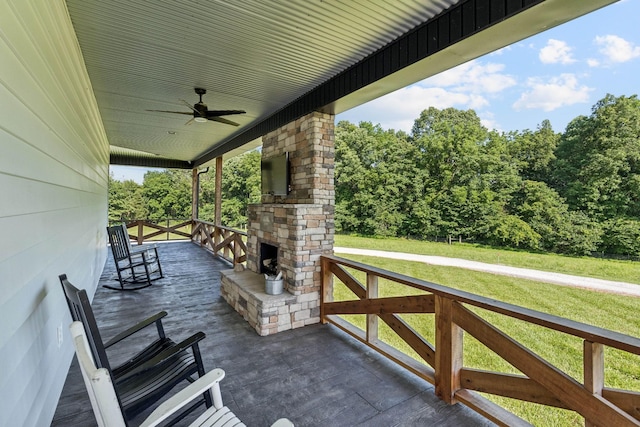 2427 Green Valley Rd, Lafayette, TN 37083 - view of patio / terrace with an outdoor stone fireplace and ceiling fan