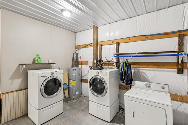 2427 Green Valley Rd, Lafayette, TN 37083 - laundry area with water heater and independent washer and dryer
