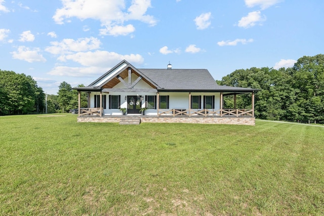 2427 Green Valley Rd, Lafayette, TN 37083 - back of property with a porch, a yard, and a shingled roof