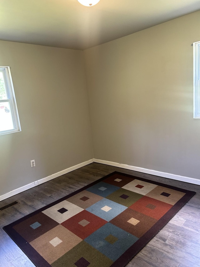 1775 Old Beech Creek Rd, Waynesboro, TN 38485 - unfurnished room with dark wood-style floors and baseboards